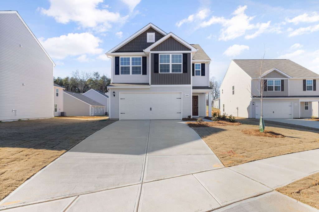 Concrete driveway at a New Orleans home built on clay soil