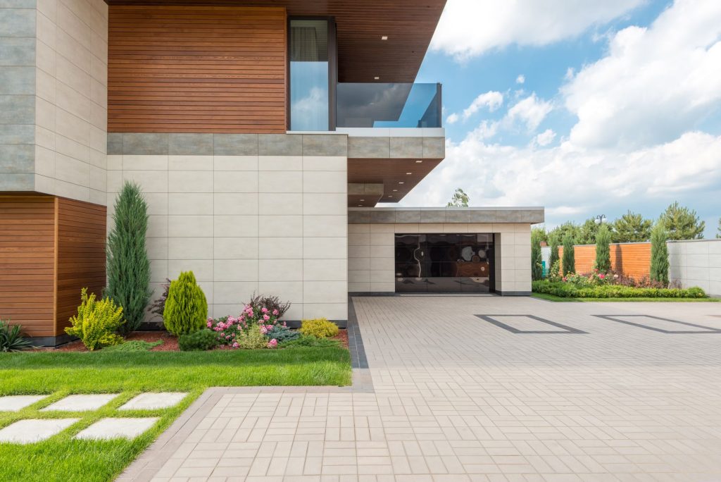 New Orleans concrete driveway in front of a modern home