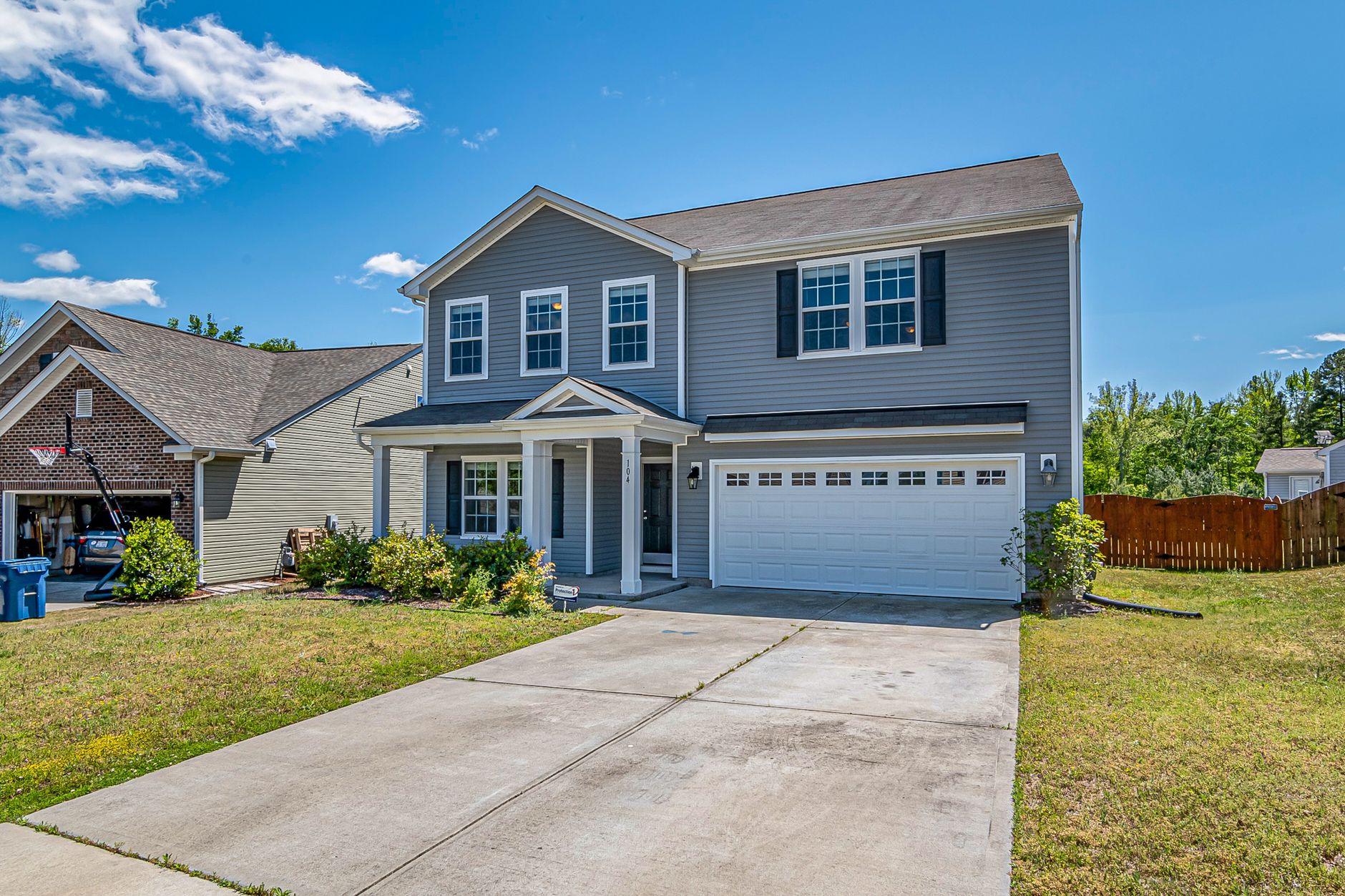 Two-car concrete driveway at a suburban Louisiana home